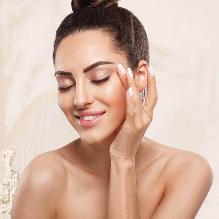 Beautiful woman with rejuvenated skin promoting Laser Treatment for Wrinkles and fine lines in Naperville, IL