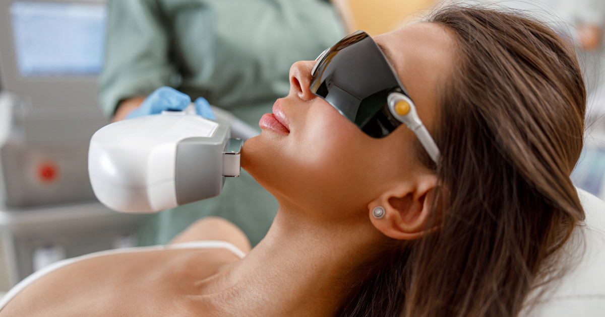 a woman getting a laser facial with bbl hero